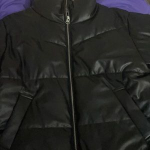 Heavy leather coat. Size s but fits big